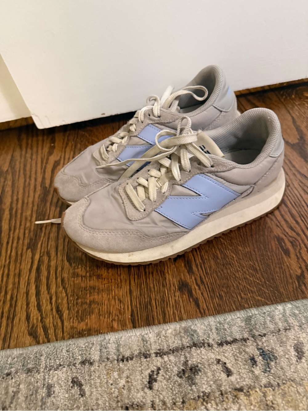 New Balance Women's Gray Sneakers with Light Blue Accents